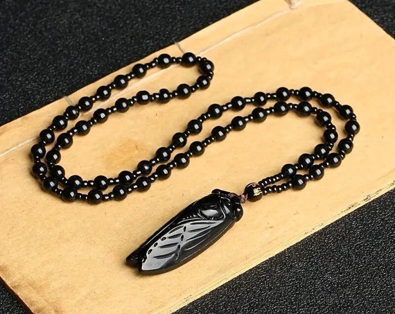 Wonderful Deco style black carved glass cicada pendant necklace 24"