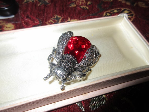 Wonderful Deco style silverplated red glass bug brooch