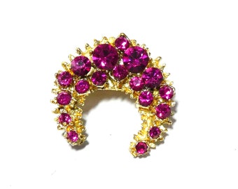 Lovely vintage goldtone magenta rhinestone crescent brooch