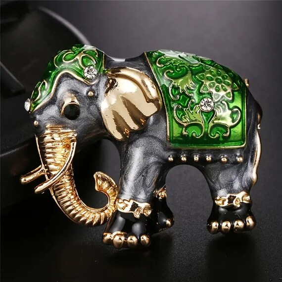 Lovely goldtone black and green enamel elephant brooch