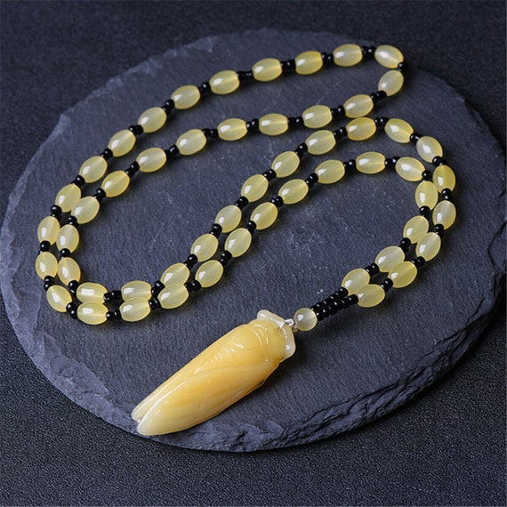 Wonderful Deco style yellow jade & black glass cicada pendant necklace