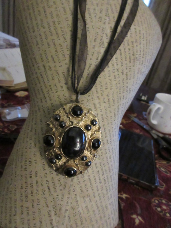 Lovely vintage large gold plated black glass and hematite pendant