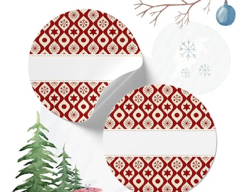 May include: Two round red and white Christmas gift tags with a snowflake and star pattern. The tags have a white space for writing.