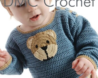 May include: A blue crocheted baby sweater with a brown bear face on the front. The sweater has a brown crocheted trim around the neckline and sleeves. The sweater has two brown buttons on the shoulder.