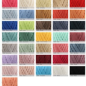 May include: A color chart of yarn skeins, each with a different color and number code. The colors include pink, blue, green, yellow, red, purple, brown, orange, white, black, and grey.