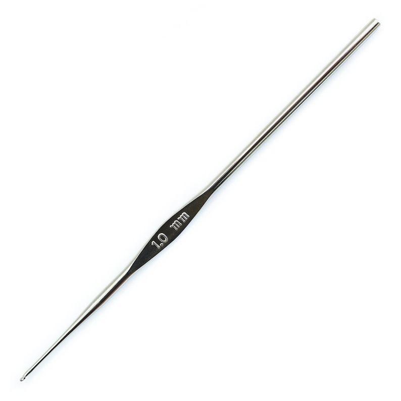 May include: A silver crochet hook with a 1.0 mm size marking.