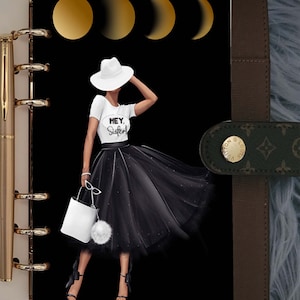 May include: A black and white illustration of a woman wearing a white hat, a white t-shirt with the text "HEY. Sister!" printed on it, a black tulle skirt, and black heels. She is holding a white handbag and a pair of sunglasses. The background is black with four gold crescent moons.