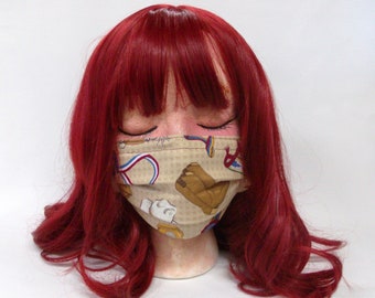 Handmade 100% cotton double layer pleated western print face mask with nose wire, elastic ear loops, and filter pocket. Machine Washable