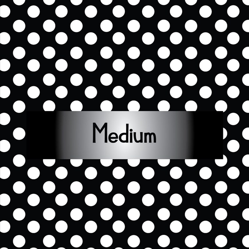 May include: Black and white polka dot pattern with a silver and black banner that says "Medium".