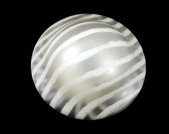 May include: A white and gray striped glass sphere with a smooth, shiny surface.