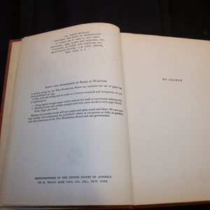 May include: A close-up of the copyright and manufacturing information page of a book. The text reads "About the Appearance of Books in Wartime" and "Manufactured in the United States of America by H. Wolff Book Mfg. Co., Inc., New York".