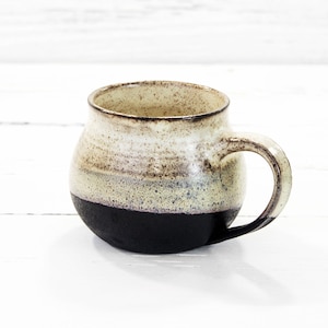 Hand thrown ceramic tea, coffee cup. Black beige barrel shaped pottery mug handmade. Modern farmhouse, wheel thrown artisan drinkware