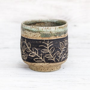 Handcrafted ceramic tea, coffee cup with floral drawings. Wheel thrown pottery wine, sake cup. Modern farmhouse, rustic boho style drinkware