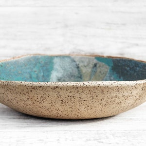 Handmade shallow stoneware bowl. Modern artisan functional pottery