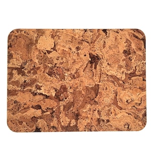 May include: Rectangular cork board with rounded corners. The surface has a natural, mottled pattern of light and dark brown tones. The cork texture is visible, with small holes and variations in color.