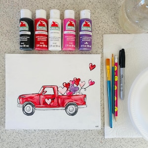 May include: A red pickup truck with a white bed filled with pink, purple, and red hearts. The truck is on a white canvas with the initials KH in the bottom right corner. There are five bottles of paint in the background, one black, one bright red, one white, one pink, and one red.