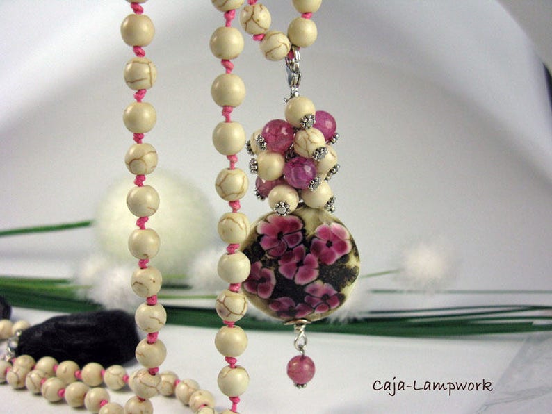Long chain with very large Lampwork flower bead Howlithperlen knotted