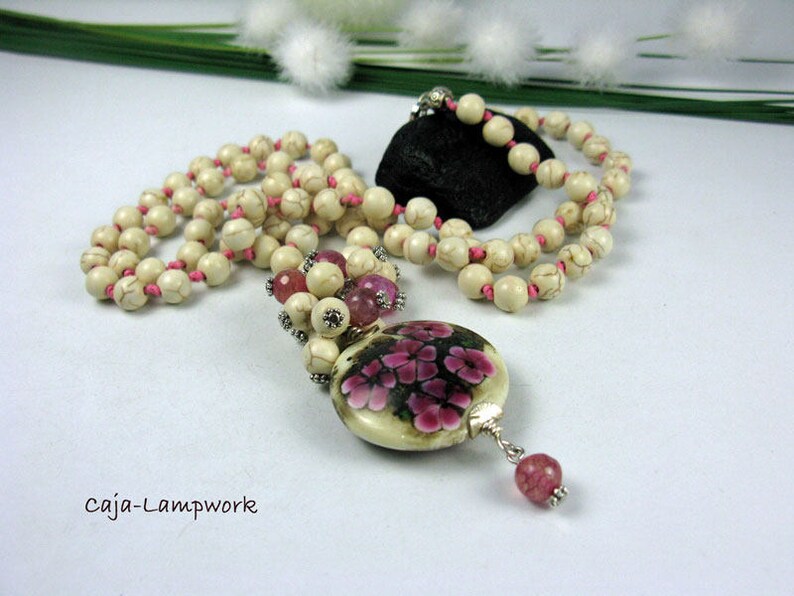 Long chain with very large Lampwork flower bead Howlithperlen knotted