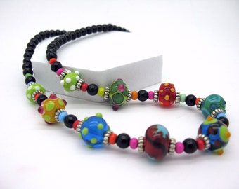 Short cheerful black colorful lampwork necklace, handmade glass beads, t-shirt necklace for every day