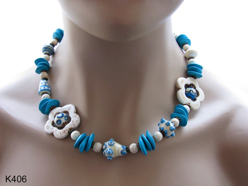 playful unique Turquoise necklace made of handmade glass beads turquoise lampwork necklace ceramic and howlite flower beads
