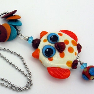 Long necklace with a very large colorful owl, orange lampwork eagle owl with colorful decoration, cheerful, playful