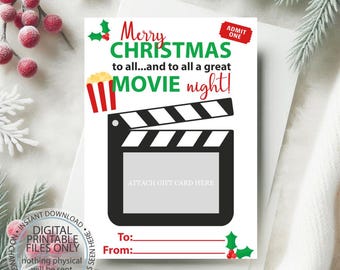 May include: A printable Christmas movie night gift card with a red and white popcorn bucket, a black and white clapperboard, and a space to attach a gift card. The text reads "Merry Christmas to all...and to all a great movie night!"