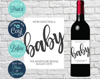 May include: A printable wine bottle label with the text "We're expecting a baby. The adventure begins August 2019." The label is white with black text and a black cursive "baby" graphic.