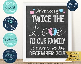 May include: A framed chalkboard-style sign with white text announcing "We're adding TWICE THE Love TO OUR FAMILY." Pink and blue footprints and hearts accent the design. The sign is for Johnston twins due December 2018. The sign is 16x20 and 8x10 inches.