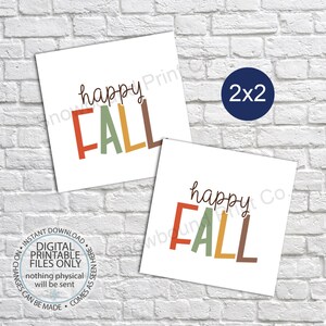 May include: Two white square prints with the words "happy FALL" in a colorful, fall-themed font. A dark blue circle with "2x2" is in the upper right. The bottom left corner has text that reads "DIGITAL PRINTABLE FILES ONLY".