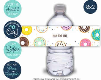 May include: Water bottle label template with a donut theme. The label is white with colorful donuts and sprinkles. The text on the label says "Your Text Here".