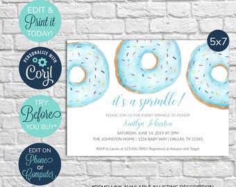 May include: A baby sprinkle invitation with three watercolor donuts in shades of blue with colorful sprinkles. The text "it's a sprinkle!" is written in cursive. Additional text includes the honoree's name, date, time, and location. The invitation is 5x7 inches.