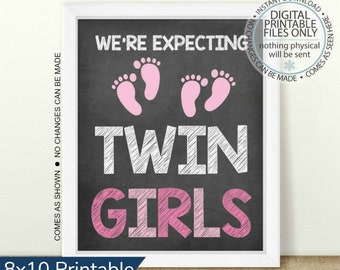 May include: A printable 8x10 inch chalkboard style announcement that says "We're Expecting Twin Girls" with pink footprints and the words "Twin Girls" in pink.