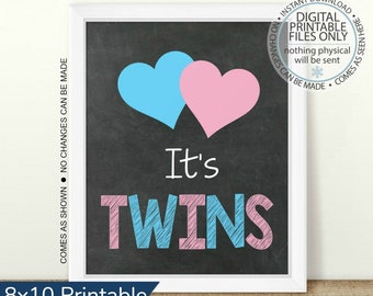 May include: Printable 8x10 inch chalkboard style sign with the text "It's Twins" in pink and blue. Two hearts, one blue and one pink, are above the text.