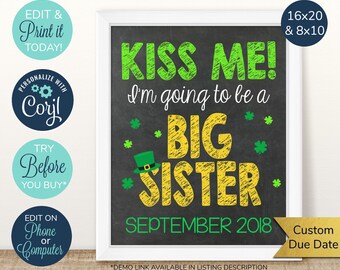 May include: A printable sign with a chalkboard background, green shamrocks, and the text "Kiss Me! I'm going to be a Big Sister September 2018".