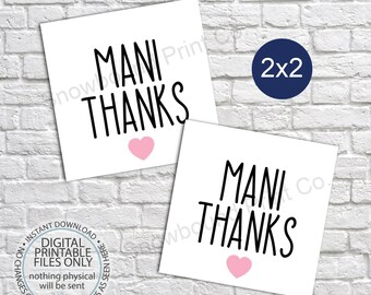 May include: Two white square thank you cards with black text that reads "Mani Thanks" and a pink heart. The text "2x2" is printed in blue on a white background.