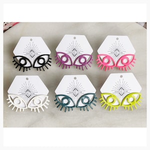 Les boucles d’oreilles Argos ••• Différentes couleurs sur les boucles d’oreilles Brass Post