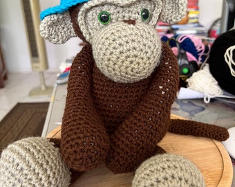 Handmade crocheted cool monkey with blue cap plush soft toy