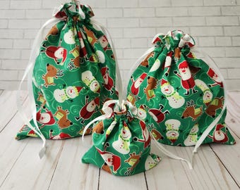Holiday Santa fabric gift bag, reusable drawstring bag, gift bag for all occasions, makeup bag, reusable gift wrap, Christmas gift bag