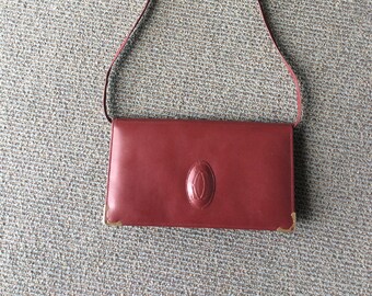 Cartier shoulder bag 1978 burgundy leather.