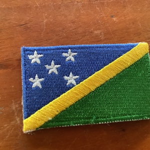 Vintage Solomon Island flag souvenir patch.