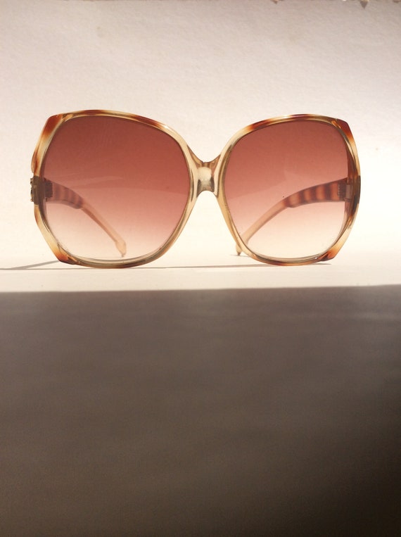Vintage 1970’s oversized YSL sunglasses.