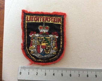 Vintage Liechtenstein metallic woven patch