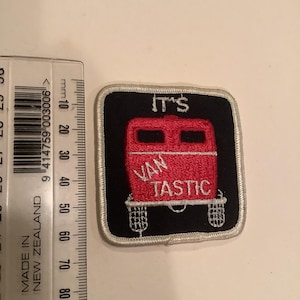 May include: Embroidered patch with a red van design and the words "IT'S VANTASTIC" in white. The patch has a black background with a white border. The patch is approximately 2 inches wide and 2 inches tall.