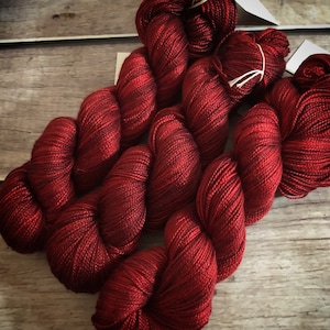 Dark Lacquer Red on Ginseng (f) mulberry silk fingering weight yarn, The Forbidden Garden Collection, dto, 400m 100gms, 4 ply weight