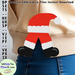 May include: Machine embroidery file design of Santa Claus's legs and feet wearing a red suit with white trim and black boots. The design is on a beige sweatshirt with blue jeans.