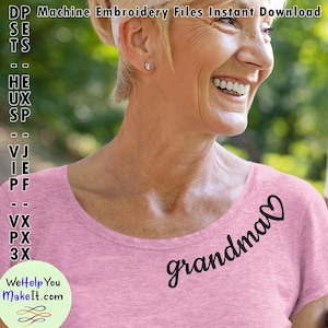 May include: A pink t-shirt with a black embroidered design that says "grandma" with a heart at the end. The embroidery is on the left side of the shirt, near the neckline.