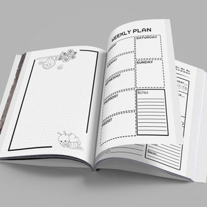 May include: Open weekly planner with a black and white bee theme. The left page features a beehive and flowers, the right page has a weekly planner with days of the week and a notes section. The planner has a black and white striped border.