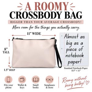 May include: A light pink crossbody bag with a black zipper and wrist strap. Text indicates dimensions of 11 inches wide, 8 inches tall, and 1.5 inches deep. The bag is compared to a piece of notebook paper measuring 8.5 inches by 11 inches.