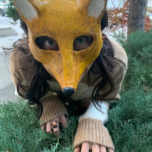 Papier mache fox mask. Bring a touch of the wild into your home with this one-of-a-kind fox paper mâché mask.