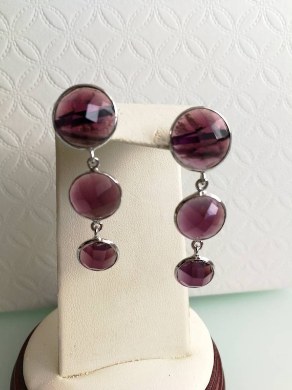 Real stone earrings of amethyst. Ancient earrings.